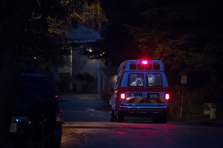 caption: An unidentified patient is transported to the hospital from the Life Care Center of Kirkland, the long-term care facility at the epicenter of the coronavirus outbreak in Washington state, on Monday, March 2, 2020, in Kirkland. It is unclear if the patient is suspected of having coronavirus.